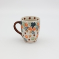 Mug BEL A38 D113 – hand-painted Bolesławiec pottery in a traditional pattern, practical and decorative for everyday use.