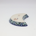 Hand-decorated Bolesławiec pottery – crescent tray, elegant table decoration.