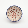 Boleslawiec ceramic bowl on table – traditional Polish pottery for everyday use.