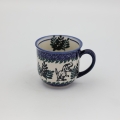 A Bolesławiec cup is a unique example of traditional, hand-decorated pottery that has delighted lovers of beautiful and durable functional ceramics for years.