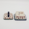 Its sturdy construction makes the butter dish durable and easy to clean. The lid protects the butter from drying out and from contaminants, while its classic or modern design fits perfectly into a variety of table settings.