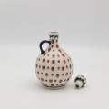 Hand-painted large kitchen utensil holder made from traditional Bolesławiec pottery. Perfect for storing spoons, spatulas, and kitchen accessories.