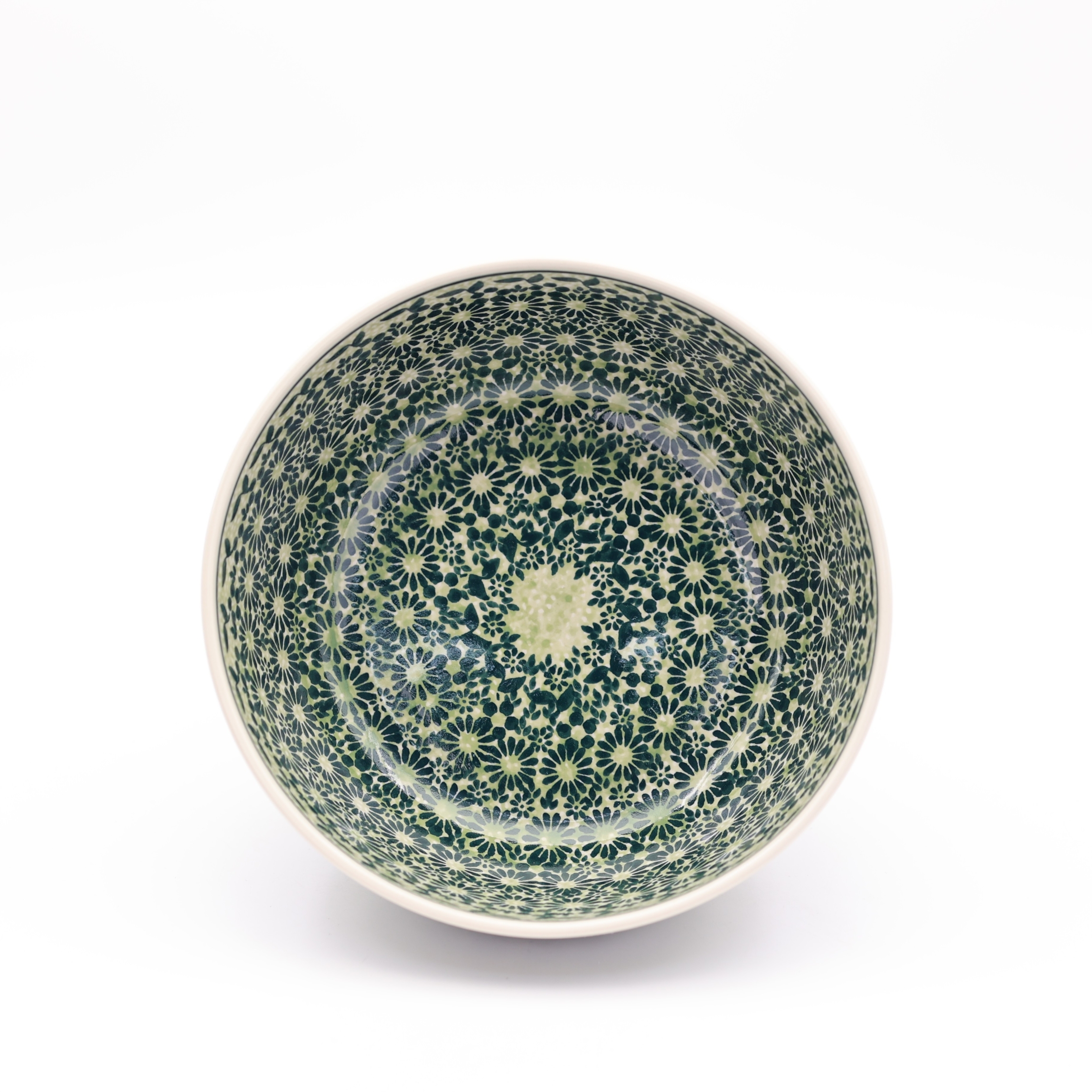 The 23 cm bowl / salad bowl A196 D105 is handcrafted Bolesławiec pottery. Perfect for serving salads, soups, or main courses. Durable, beautifully hand-painted, and safe to use — a classic example of Polish ceramic craftsmanship.