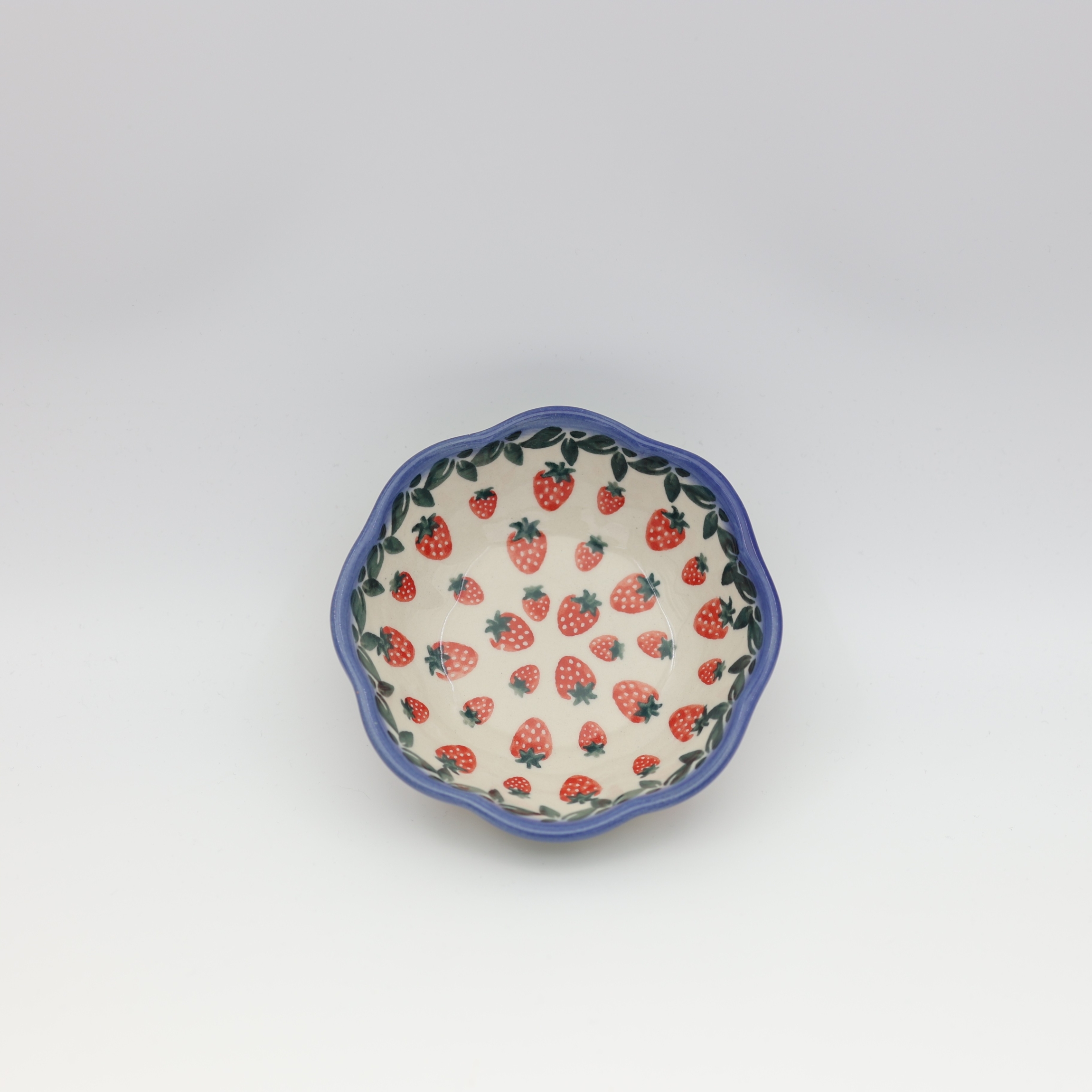 Flower bowl IV A269 D139 – hand-painted Bolesławiec pottery in a decorative flower shape with a traditional blue-and-white pattern, perfect for desserts and snacks.