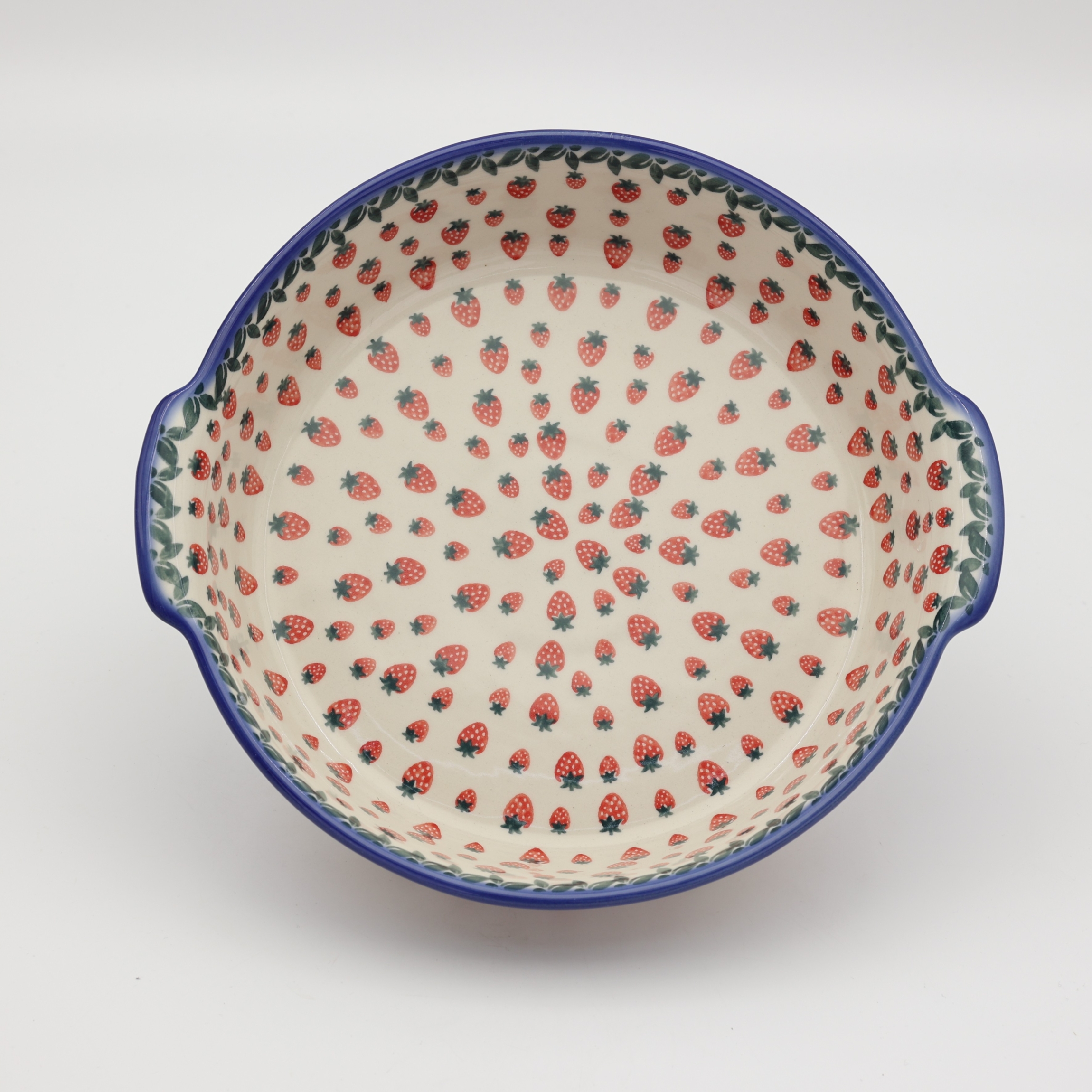 Round ceramic platter with handles A525 D139 – hand-painted Bolesławiec pottery in a traditional pattern, elegant and functional for serving dishes.