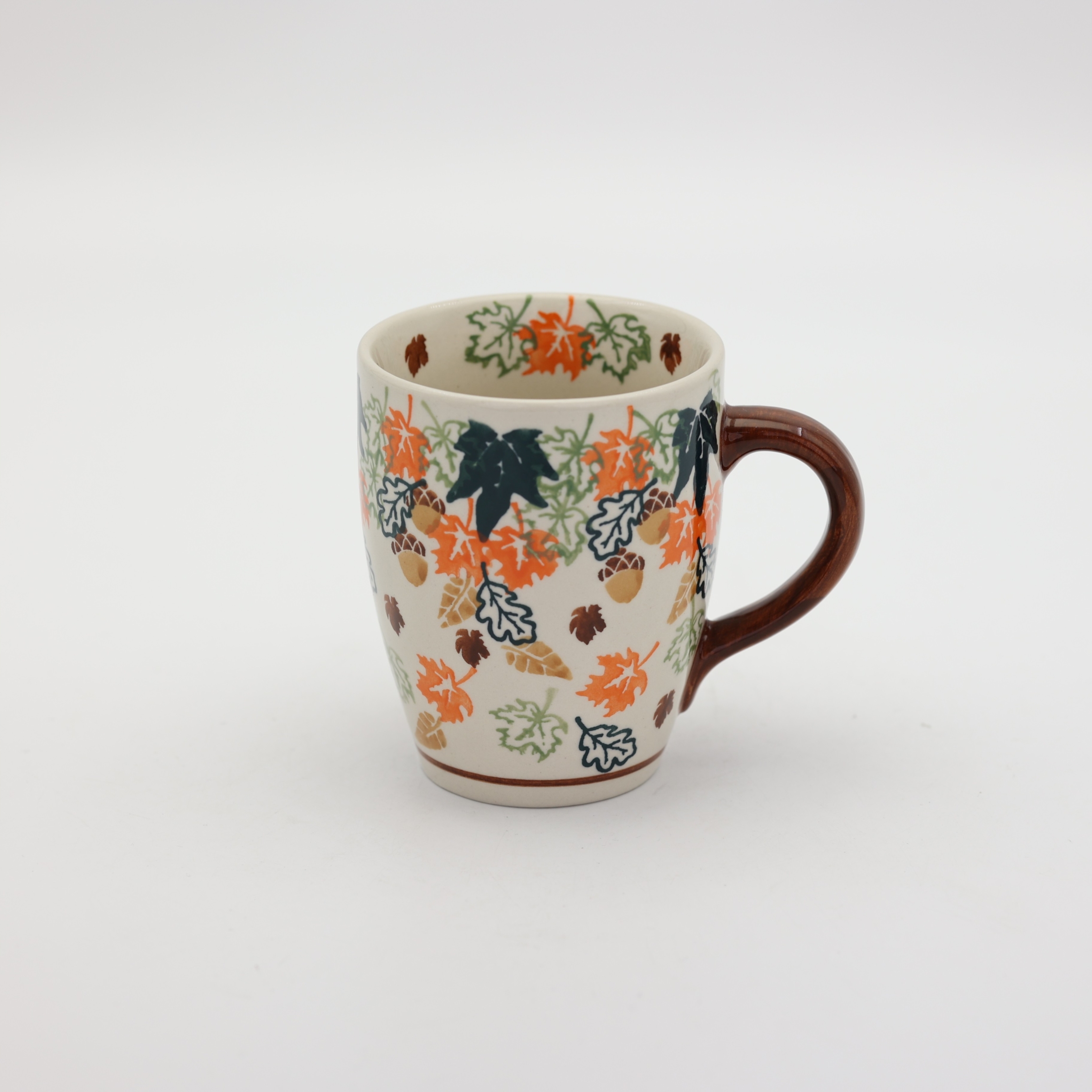 Mug BEL A38 D113 – hand-painted Bolesławiec pottery in a traditional pattern, practical and decorative for everyday use.