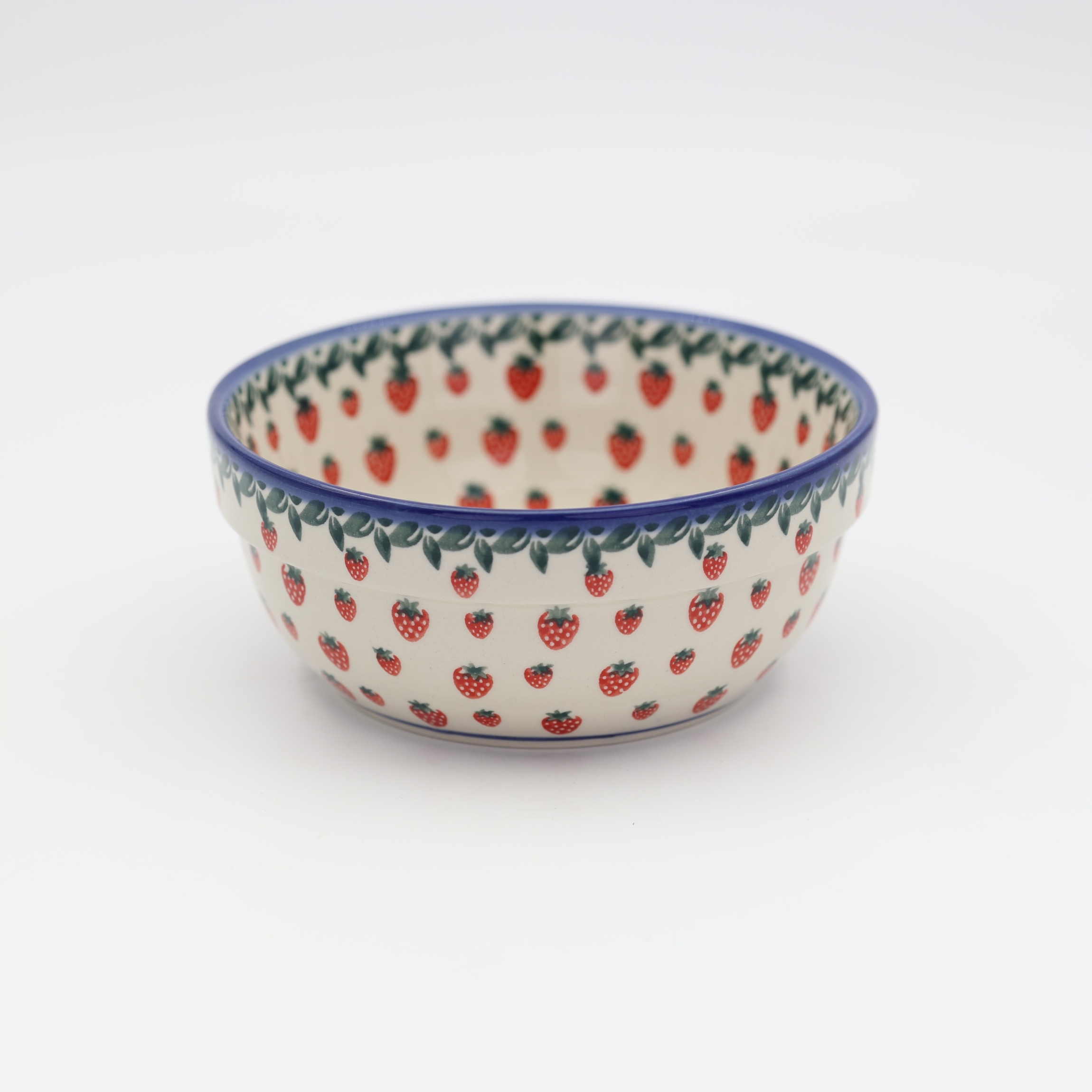 Boleslawiec ceramic bowl, hand-painted Polish pottery with traditional pattern.